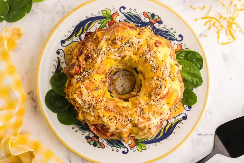 Loaded Bagel Breakfast Bake Casserole served on a plate.