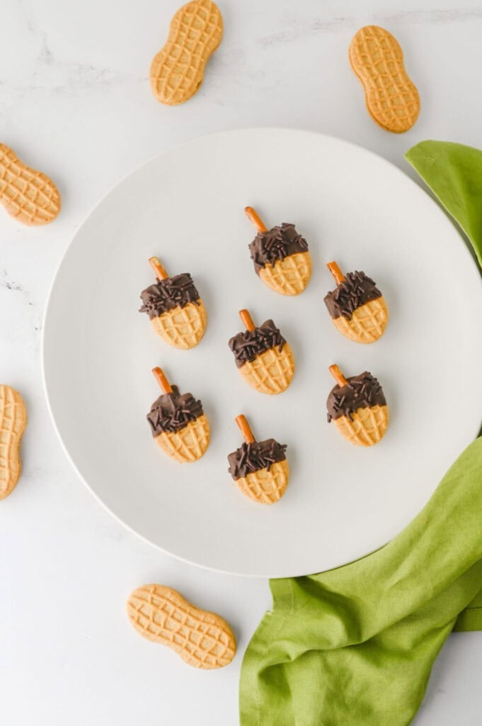Nutter Butter acorns on a plate.