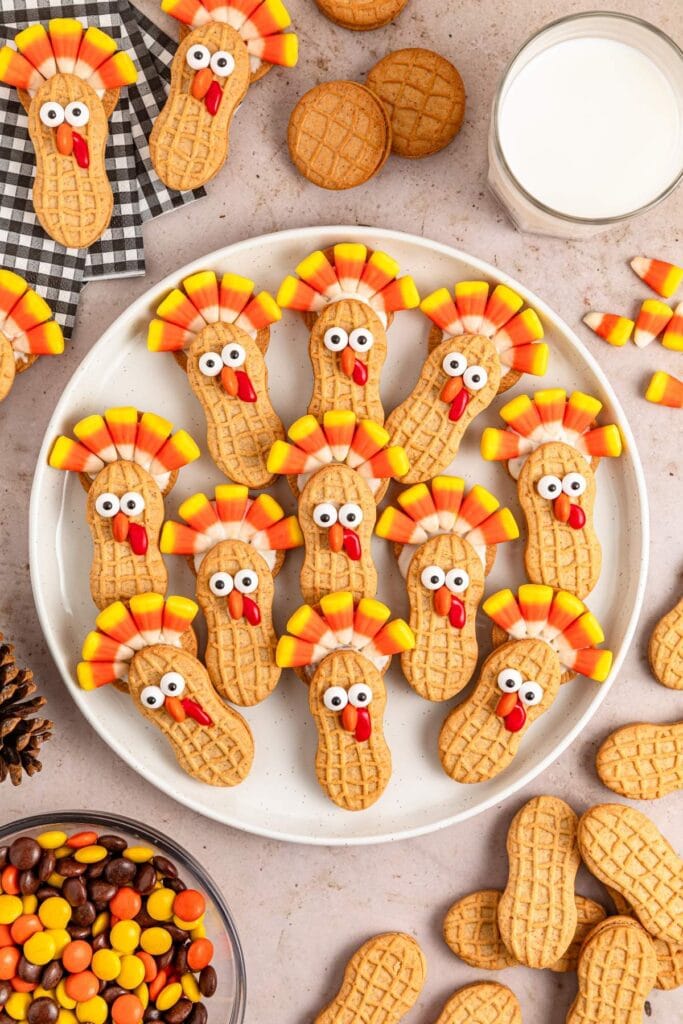 Nutter Butter turkey cookies on a plate.