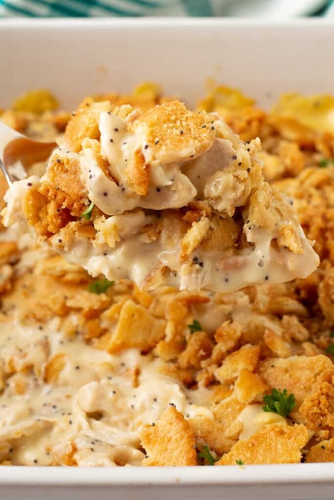 Close-up of Poppy Seed Chicken Casserole on a spoon.