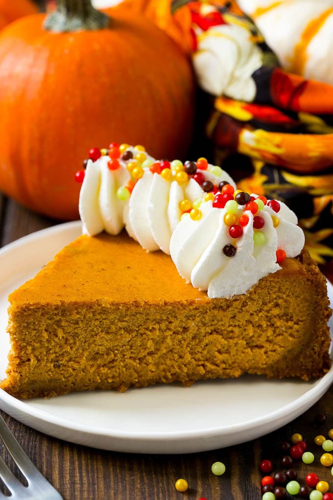 Pumpkin cheesecake on a plate.