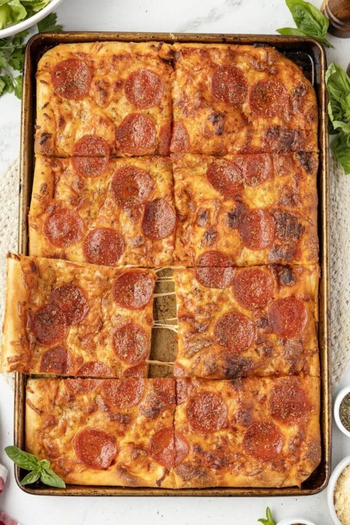 Overhead view of sheet pan pepperoni pizza.