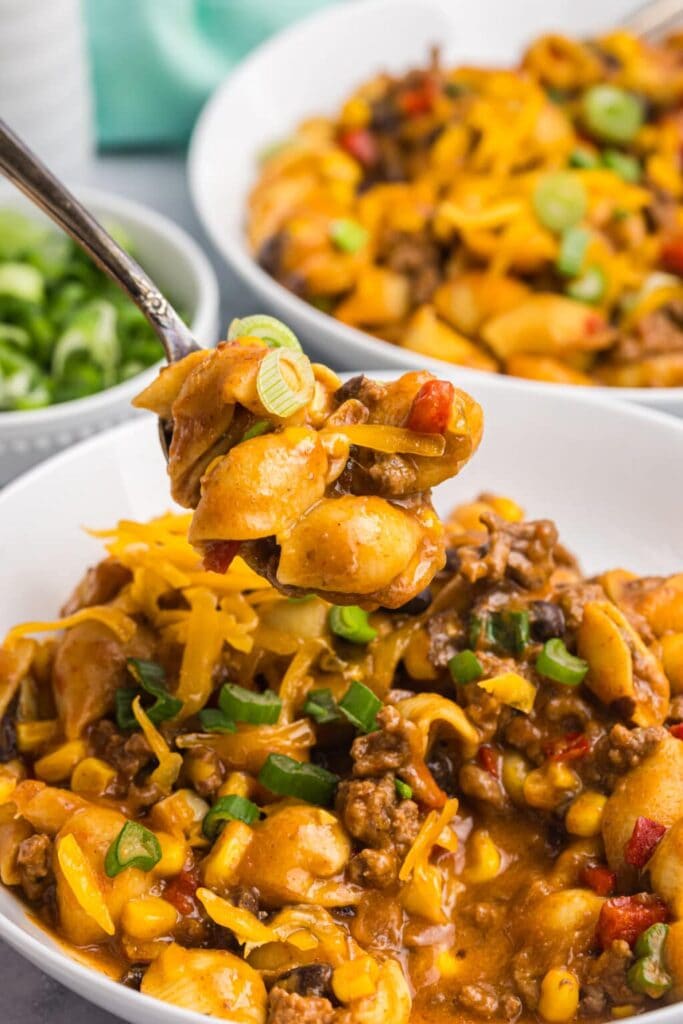 Slow cooker cheesy taco pasta in a bowl.