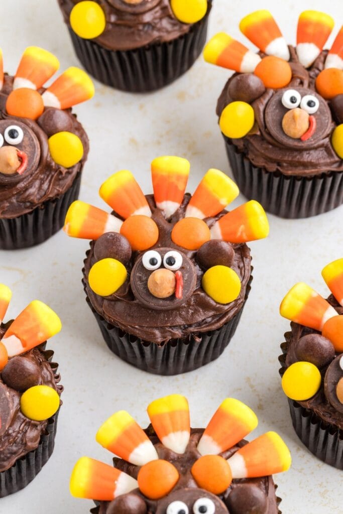Turkey cupcakes on a white table.