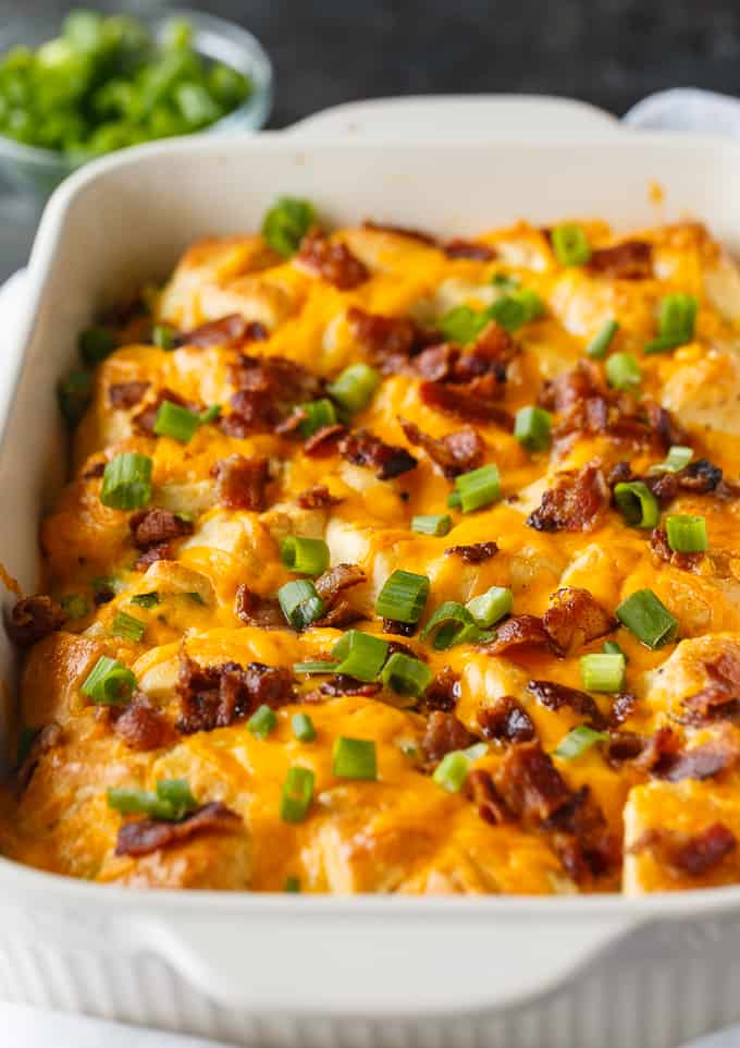 Bacon and egg biscuit casserole in a baking dish.