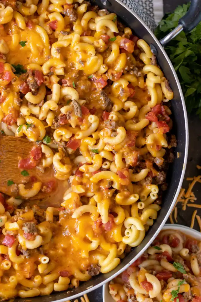 Close-up of cheeseburger pasta in a skillet.