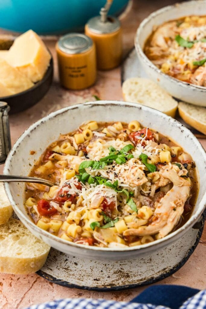 Chicken Parmesan soup served in a bowl.