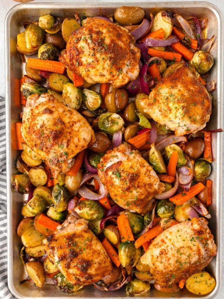 Chicken Thigh Tray Bake on a baking sheet in an overhead view.