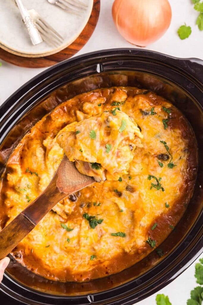 Chicken enchilada casserole in a crockpot.