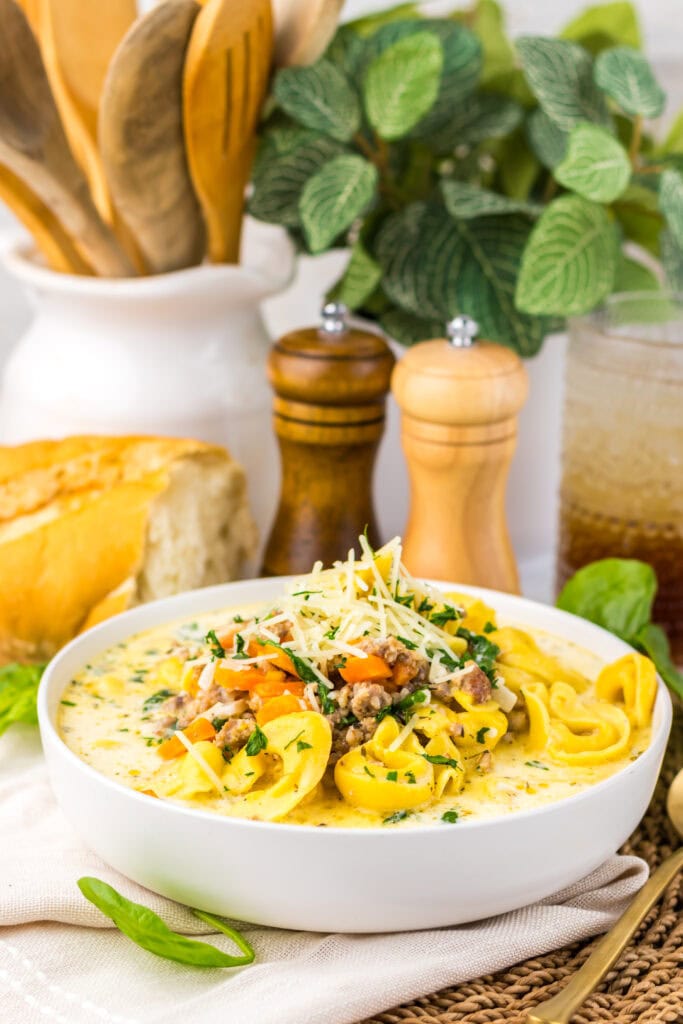 Crockpot tortellini soup in a bowl.
