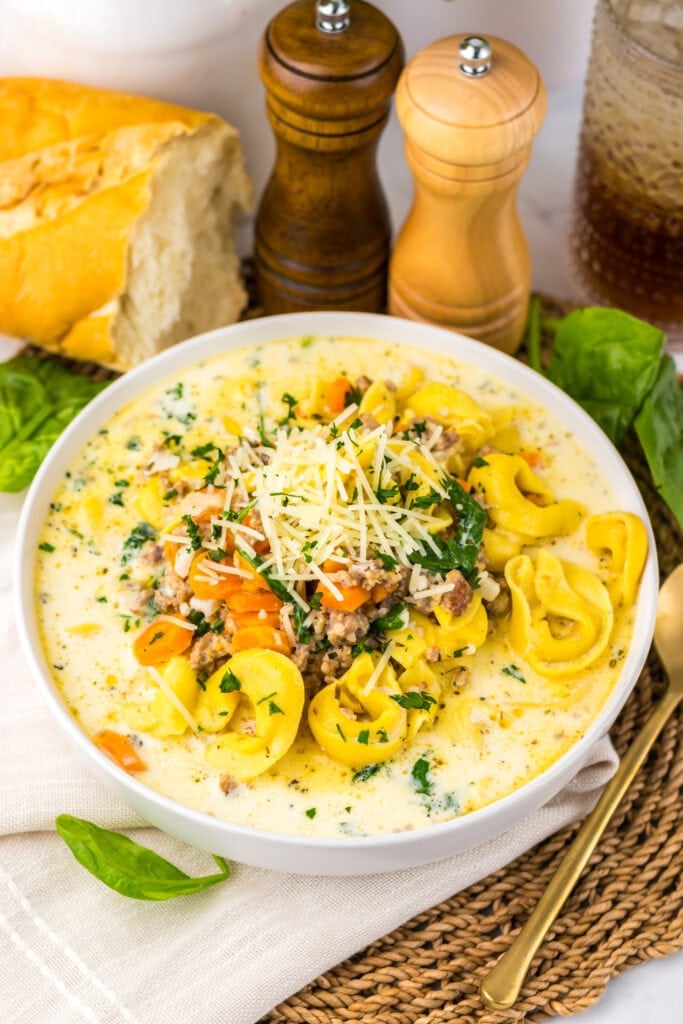 Crockpot tortellini soup in a bowl.
