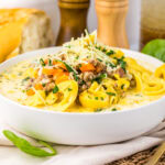 Crockpot tortellini soup in a bowl.
