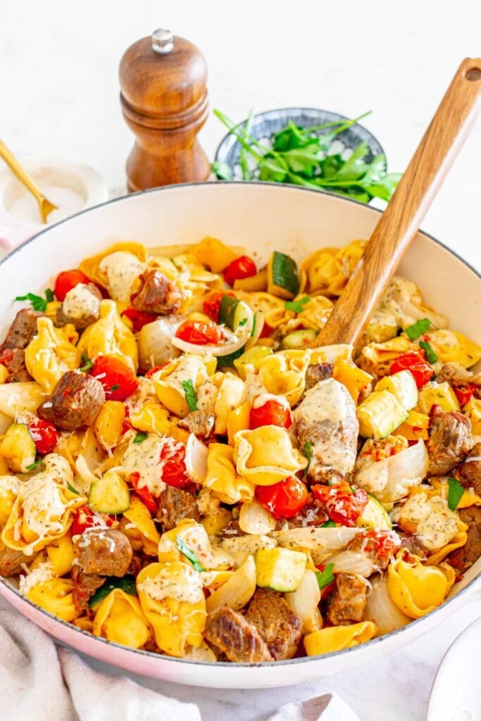 Garlic parmesan steak tortellini in a pot.