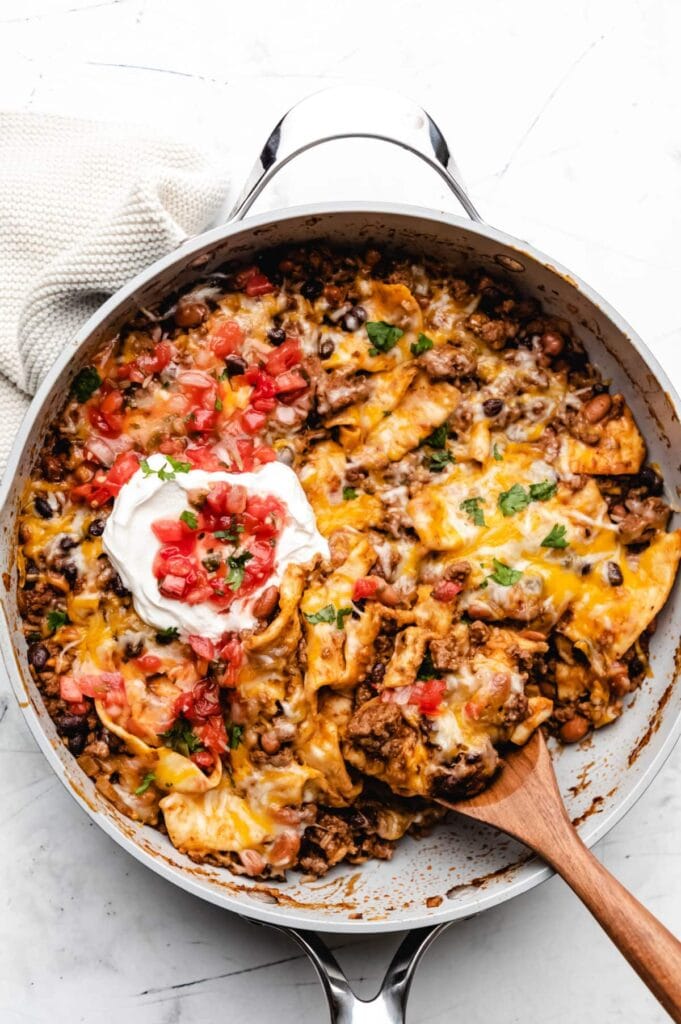 Ground beef burrito in a skillet.