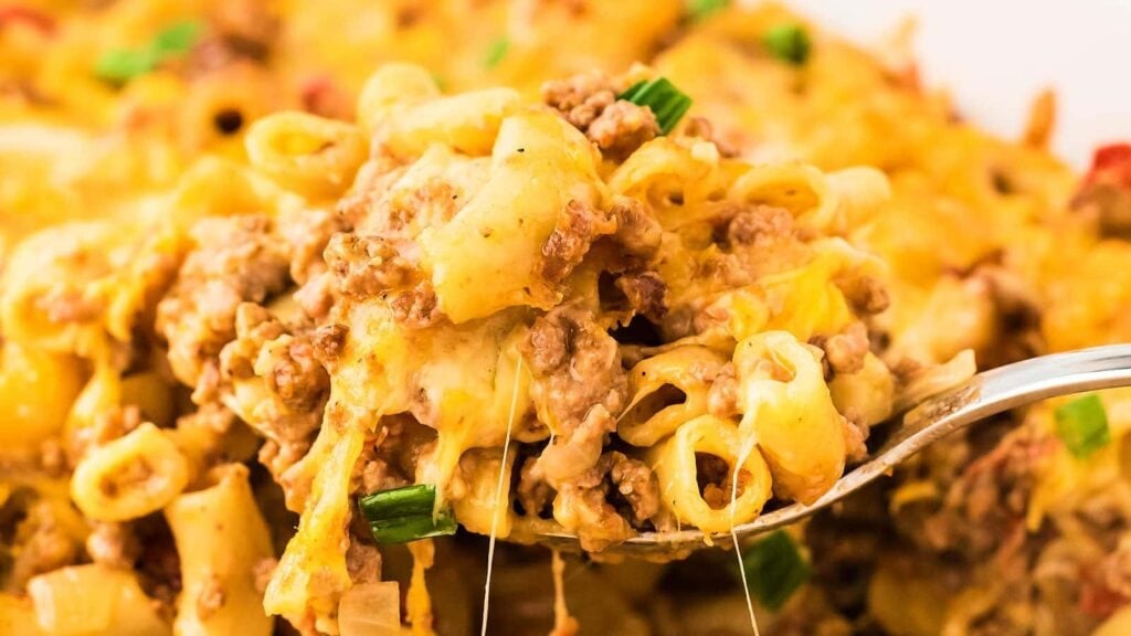 Close-up of hamburger casserole on a spoon.
