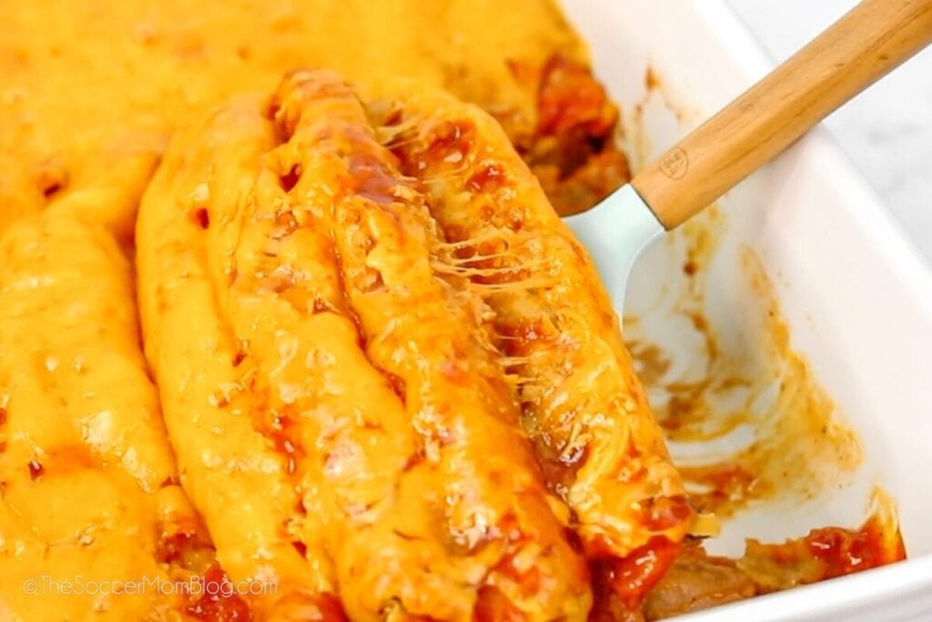 Lazy enchiladas in a baking dish with a serving spatula.