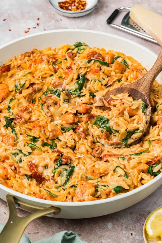 Marry me chicken orzo in a skillet.