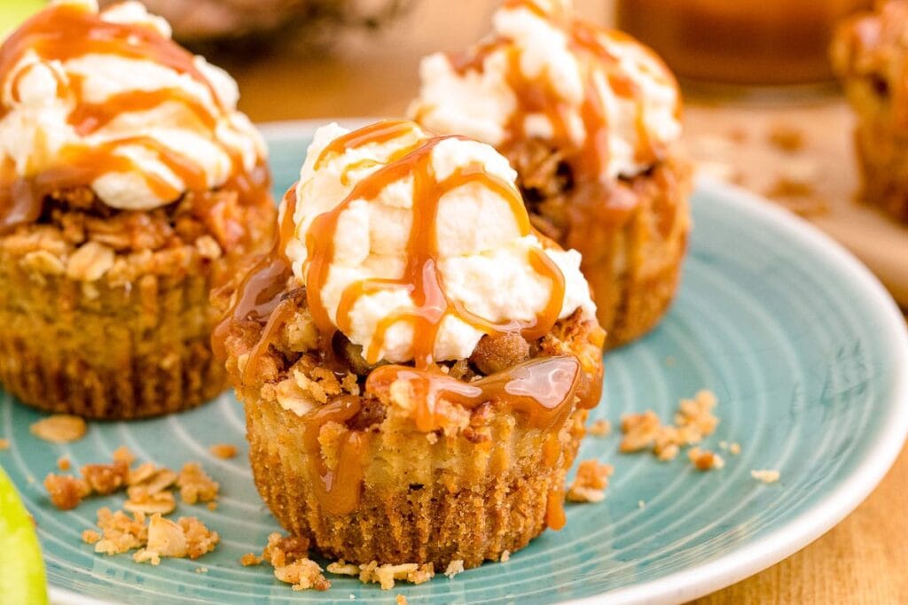 mini apple cheesecakes on blue plate