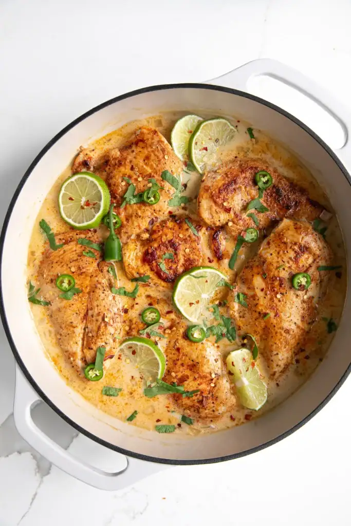 Coconut lime chicken in a pot.
