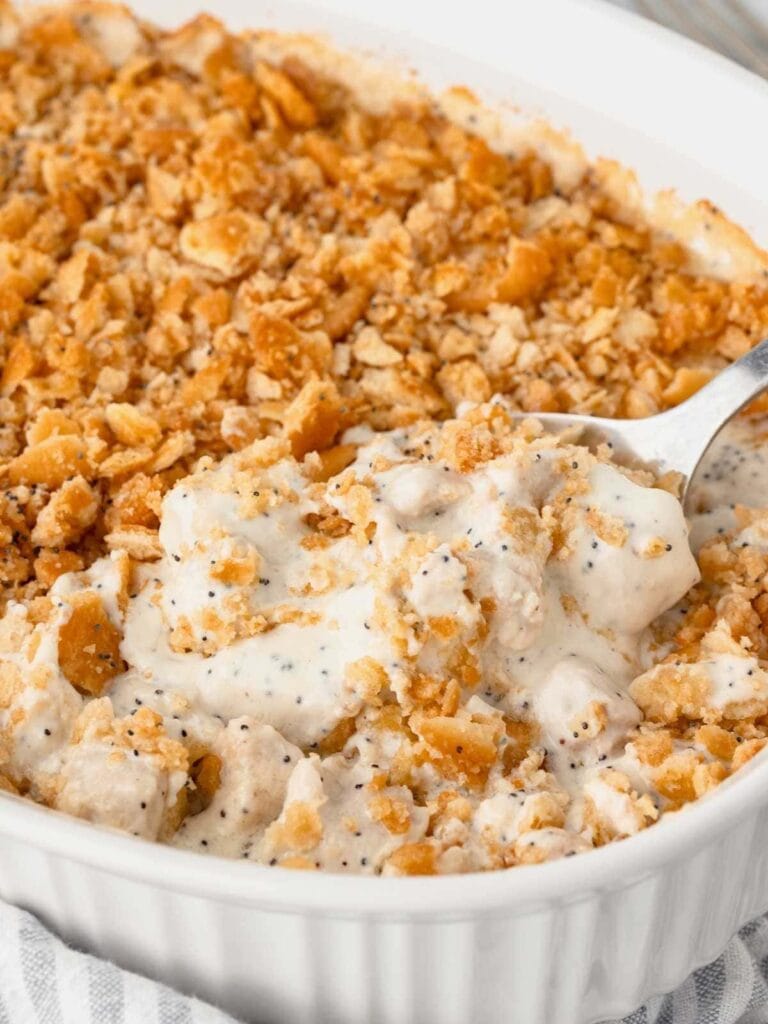 Poppy seed chicken in a baking dish.