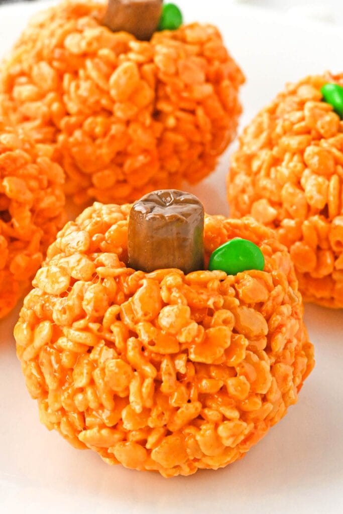pumpkin rice krispies treat on white background