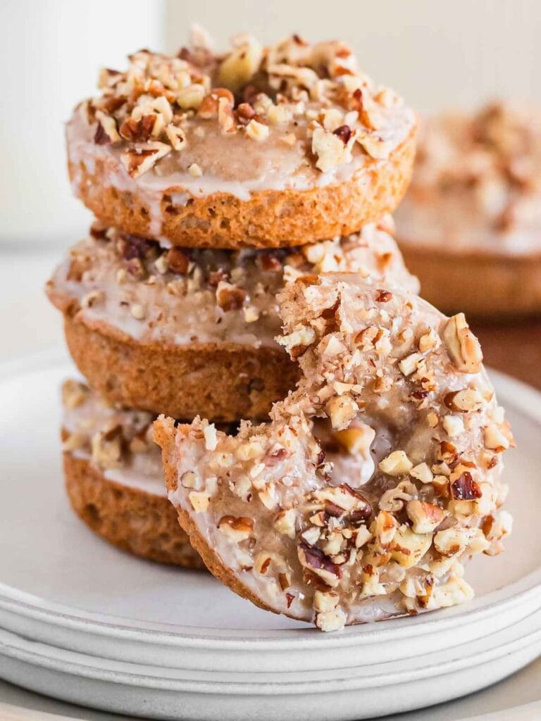 Pumpkin spice donuts served on a plate.