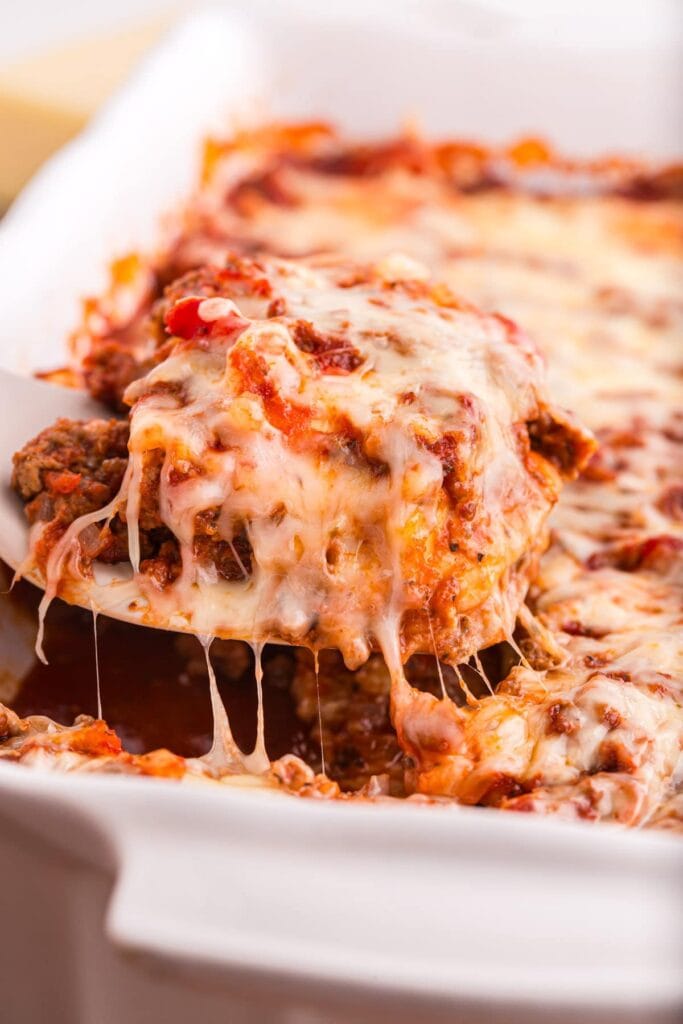 Ravioli lasagna being served.