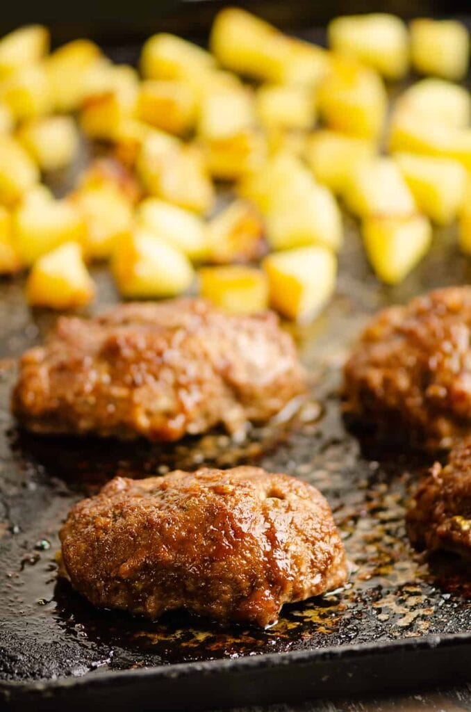 Close-up of roasted pineapple meatloaf and pineapple chunks.