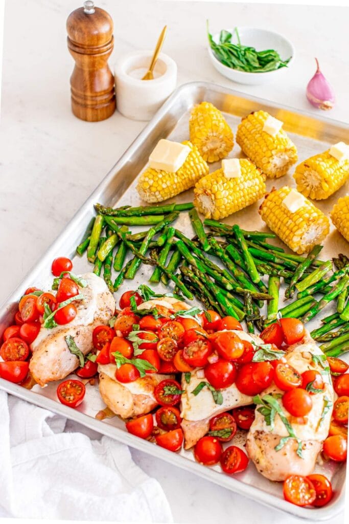 Sheet Pan Chicken Caprese on a baking sheet in an overhead view.