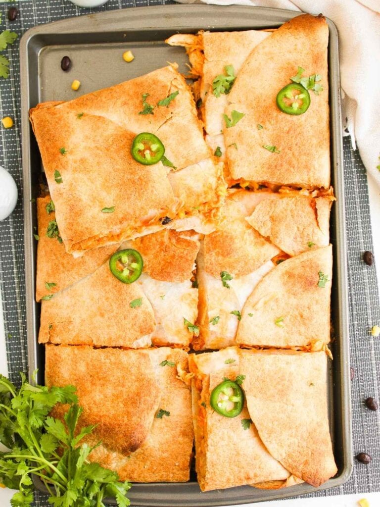 sheet pan quesadillas on a cooking tray