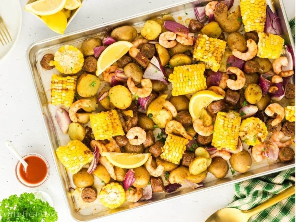 Shrimp Boil on a baking sheet in an overhead view.