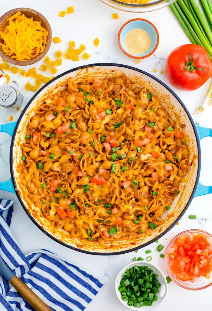 Overhead view of taco macaroni and cheese in a skillet.