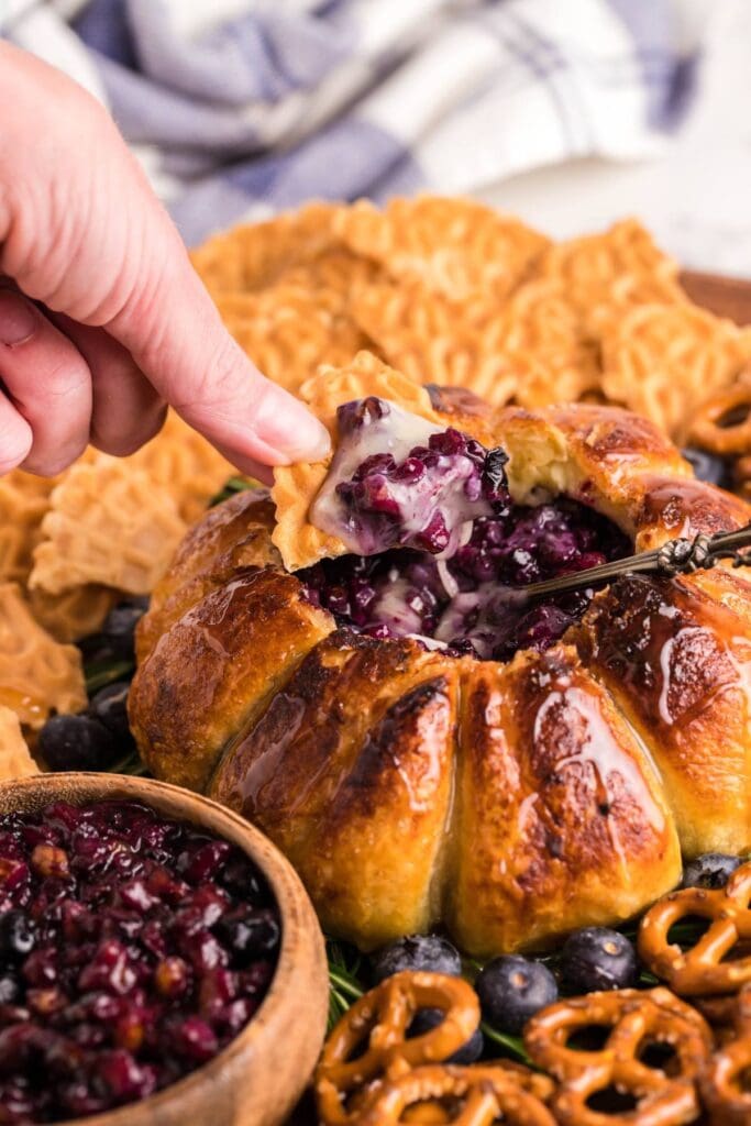 Air fryer blueberry brie pastry with dip and pretzels.
