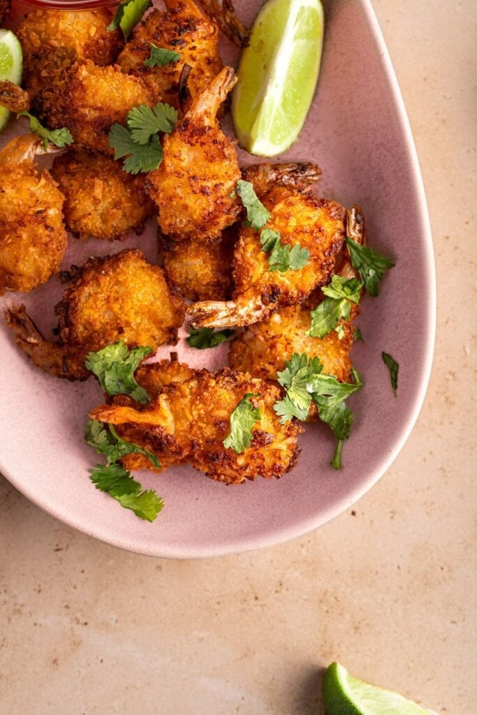 Air fryer coconut shrimp served on a plate.