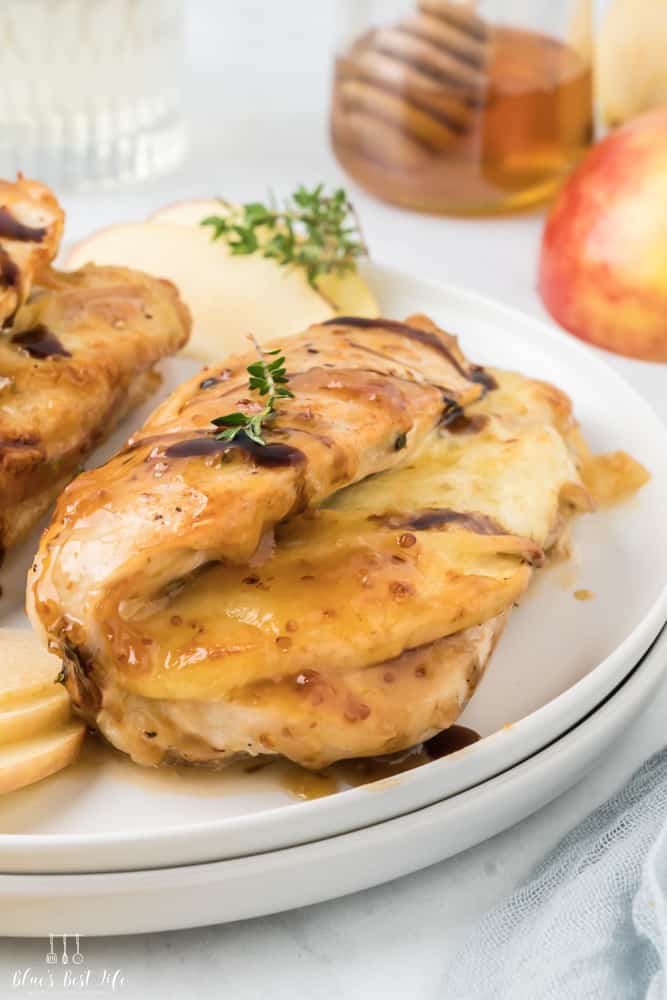 Apple brie stuffed chicken on a plate.