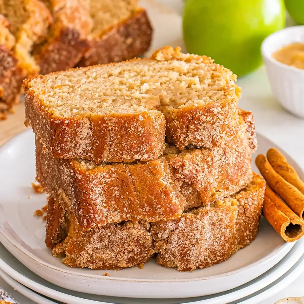 Apple cider donut bread on a plate.