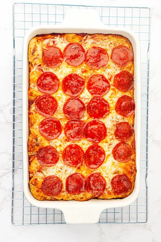 Bubble up pizza bake in a baking dish.