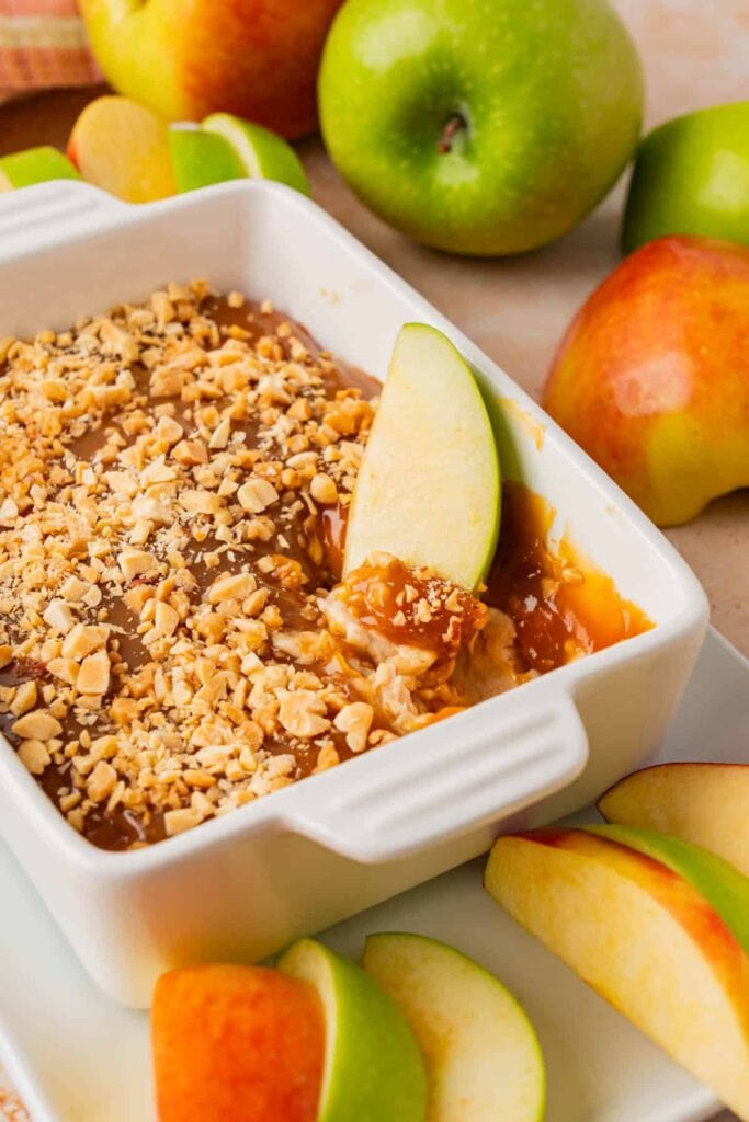 Caramel apple cream cheese dip in a bowl.