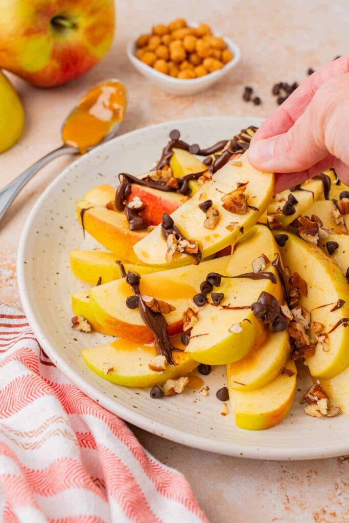Caramel apple nachos on a plate.