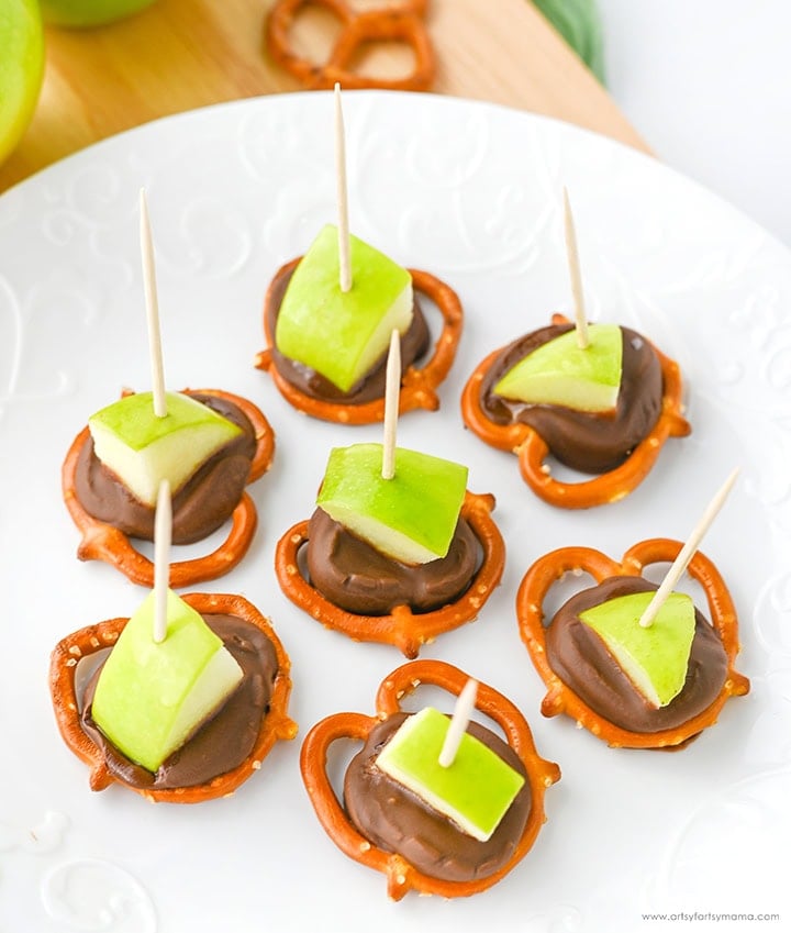 Caramel apple pretzel bites on a plate.