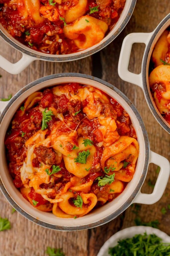 Cheesy crockpot tortellini in a bowl.
