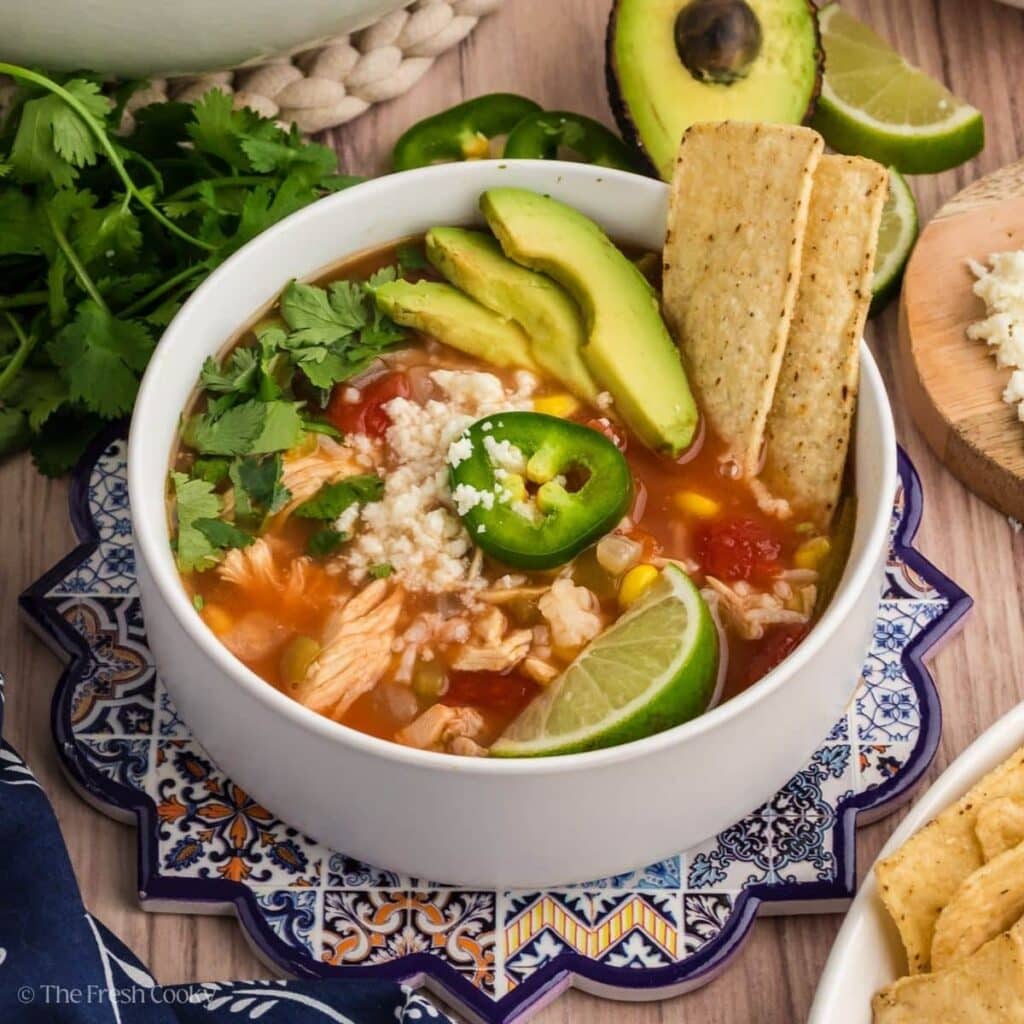 Chicken tortilla soup served in a bowl.
