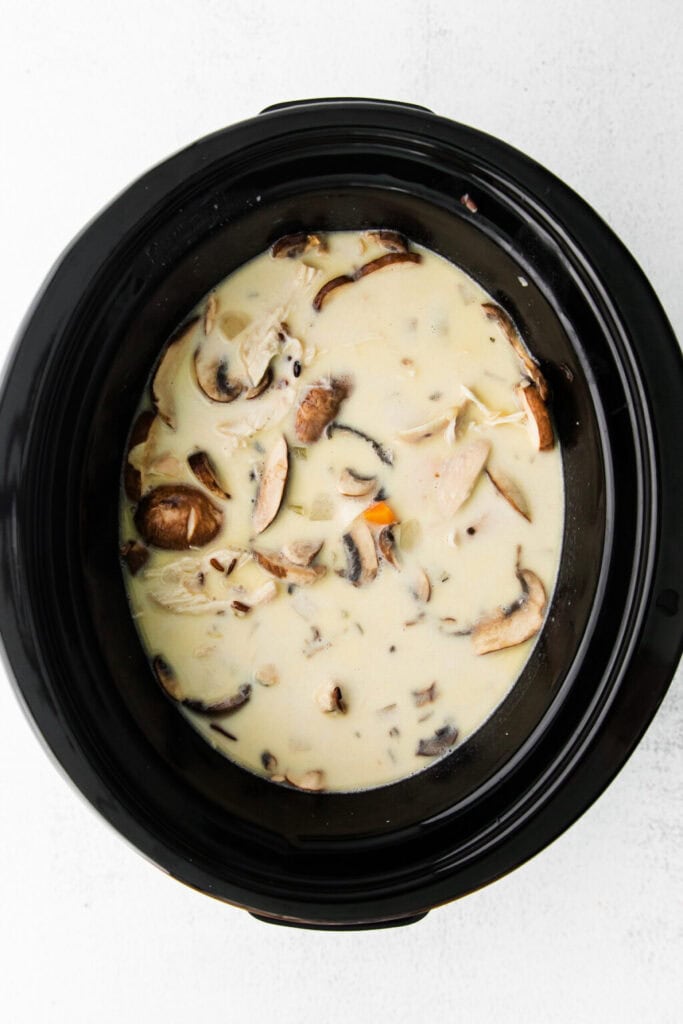 Chicken wild rice soup in a slow cooker.