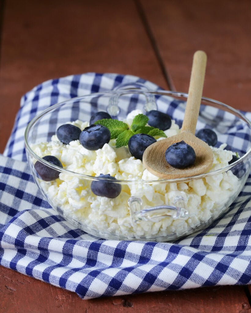 Cottage cheese and fruit in a bowl.