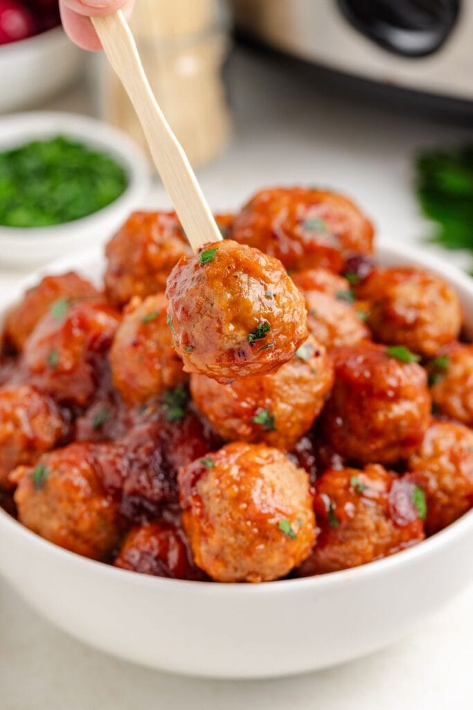 Cranberry meatballs in a bowl.
