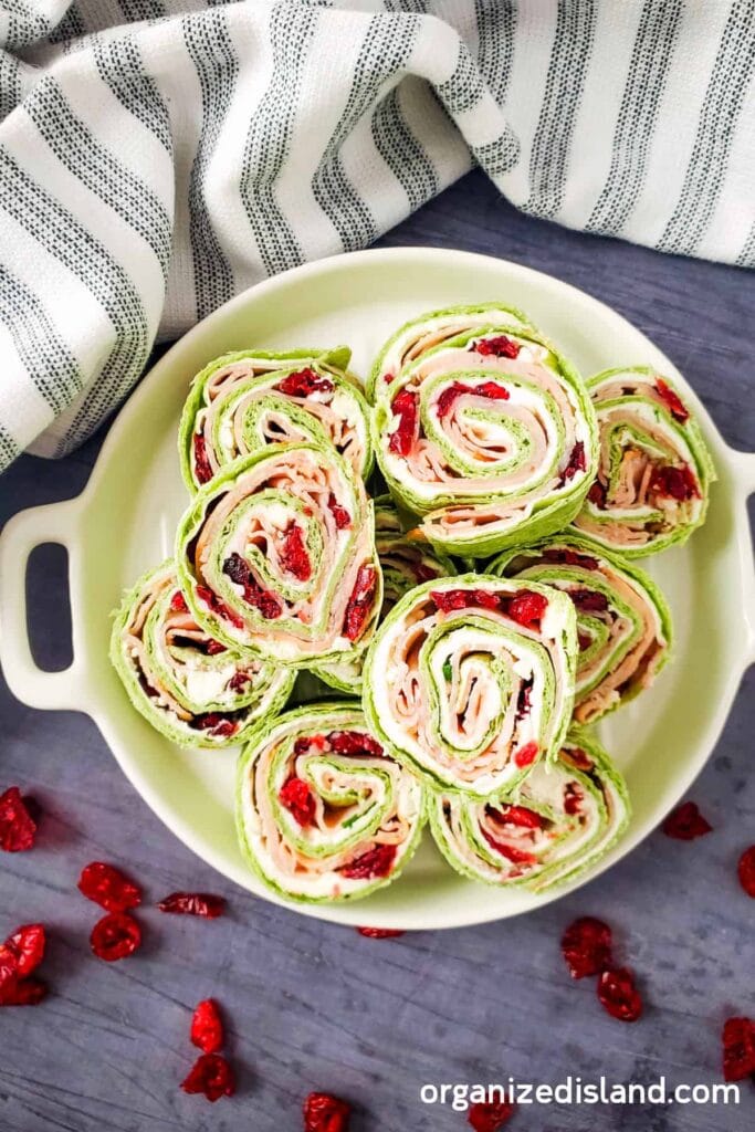 Cranberry turkey pinwheels in a serving dish.
