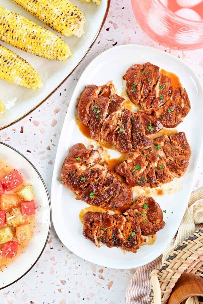 Crock pot barbecue pork chops served on a plate.