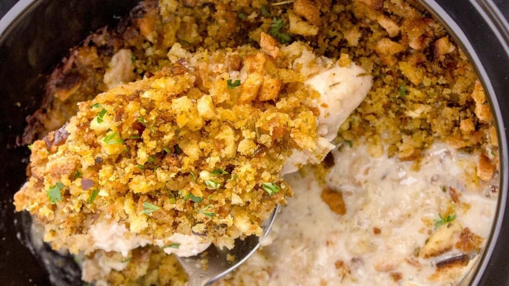 Close up of crock pot chicken and stuffing.