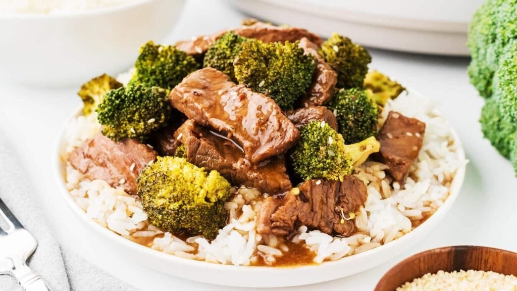 Crockpot beef and broccoli on a plate.