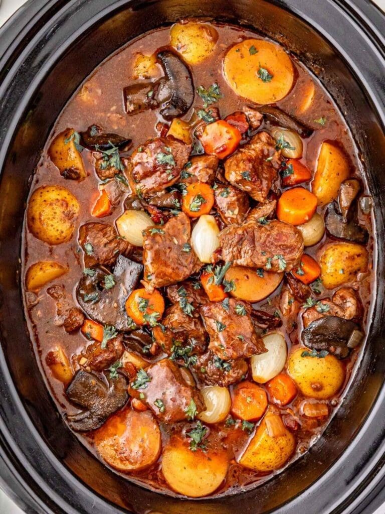 Beef bourguignon French beef stew in a slow cooker.
